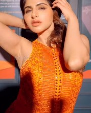 Hottie Ishwarya Menon in an Orange Dress Photos 01