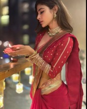 Sexy Mouni Roy in a Diwali Red Saree Photos 02