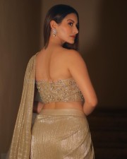 Sizzling Beauty Amyra Dastur in a Golden Saree with Matching Tube Blouse Photos 01