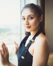 Stunning Beauty Dhvani Bhanushali in a Black Halter Neck Dress with a One Sided Belt Neckline Photos 06