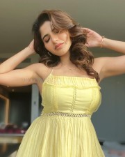 Stunning Iswarya Menon in a Yellow Shoulder Strap Maxi Dress Photos 02