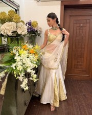 Stunning Mouni Roy in a White and Gold Lehenga Photos 01