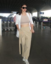 Trendsetting Mouni Roy at the Airport Photos 01