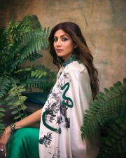 Actress Shilpa Shetty in a Emerald Green Outfit with Cream Floral Pattern Shroud Photos 01