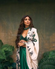 Actress Shilpa Shetty in a Emerald Green Outfit with Cream Floral Pattern Shroud Photos 02