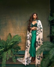 Actress Shilpa Shetty in a Emerald Green Outfit with Cream Floral Pattern Shroud Photos 04