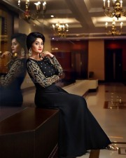 Actress Surbhi Black Dress Photoshoot Pictures