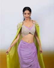 Actress Vedhika in a Lavender Skirt and Embroidered Blouse at Yakshini Trailer Launch Event Photos 01