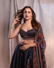 Akhanda 2 Actress Pragya Jaiswal in a Midnight Blue Floral Lehenga with a Sleeveless Blouse Photos 01