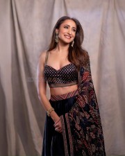 Akhanda 2 Actress Pragya Jaiswal in a Midnight Blue Floral Lehenga with a Sleeveless Blouse Photos 04