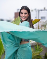 Attractive Kavya Thapar in a Stylish Saree with a Transparent Blouse Photos 01