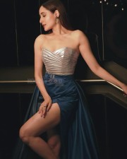 Attractive Pragya Jaiswal in a Silver and Blue Slit Dress at IIFA Utsavam 2024 Photos 02