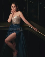 Attractive Pragya Jaiswal in a Silver and Blue Slit Dress at IIFA Utsavam 2024 Photos 06