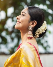 Beaming Beauty Mrunal Thakur in a Yellow Silk Saree with Sleeveless Pink Blouse Photos 02