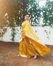 Beaming Beauty Mrunal Thakur in a Yellow Silk Saree with Sleeveless Pink Blouse Photos 04