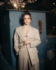 Beautiful Elli AvrRam in a Beige Blazer and Pant with Green Bra Photos 03