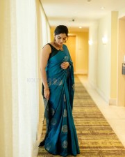 Beautiful Nikhila Vimal in a Peacock Blue Saree Photos 02