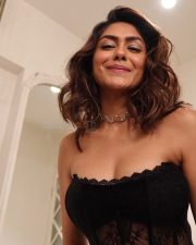 Bold and Seductive Mrunal Thakur in a Black Off Shoulder Lace Corset Style Mermaid Dress Photos 03