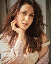 Captivating Pragya Jaiswal in a Chic White Short Dress Photos 02