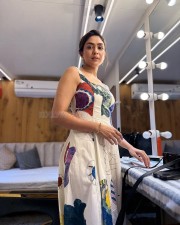 Charming Mrunal Thakur in a White Floral Printed Dress Photos 02