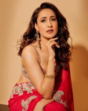 Dazzling Pragya Jaiswal in a Red Printed Saree with a Shoulder Strap Embroidered Blouse Photos 06