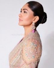 Elegant Beauty Mrunal Thakur in a Minimalistic Pastel Anarkali Dress Photos 02