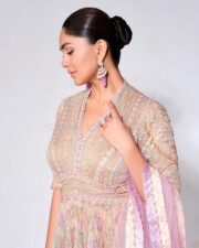 Elegant Beauty Mrunal Thakur in a Minimalistic Pastel Anarkali Dress Photos 03