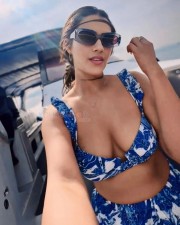 Erotic Kavya Thapar Boobs Cleavage in a Blue Bikini Photos 01