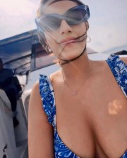 Erotic Kavya Thapar Boobs Cleavage in a Blue Bikini Photos 03