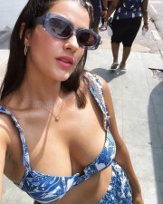 Erotic Kavya Thapar Boobs Cleavage in a Blue Bikini Photos 04