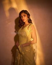 Mesmerizing Bollywood Actress Mrunal Thakur in a Yellow Embroidered Sharara Photos 08