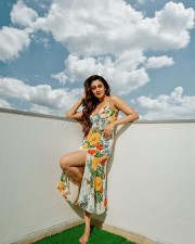 Sexy Aishwarya Arjun in a Spaghetti Strap Floral Print Dress Photos 02