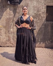 Sexy Mrunal Thakur in a Black Lehenga with Deep Neck Blouse Photos 01