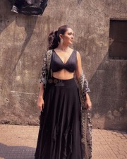 Sexy Mrunal Thakur in a Black Lehenga with Deep Neck Blouse Photos 07