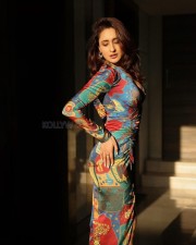 Sizzling Hot Pragya Jaiswal in a Multicoloured Printed Body Hugging Thigh Slit Dress Photos 03