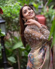 South Actress Shriya Saran in a Multi Colored Designer Saree with a Full Sleeve Blouse Pictures 04