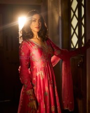 Stunning Beautiful Mrunal Thakur in a Pink Floral Print Anarkali Dress Photos 01