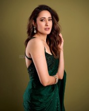 Stunning Pragya Jaiswal in a Green Saree with Sleeveless Blouse Pictures 03