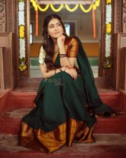 Stunning Rashi Singh in a Green and Orange Silk Half Saree Photos 01