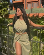 Stylish and Sexy Rashi Singh in a Light Green Sleevless Cutout Buckle Midi Dress Photos 03