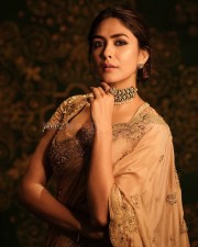 Talented Mrunal Thakur in a Golden Beige Silk Saree Photos 08