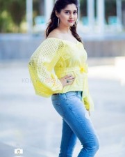 Telugu Actress Surbhi Yellow Top Blue Jeans Photos