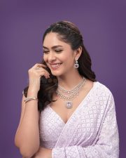 Timeless Beauty Mrunal Thakur in a Lavender Lehenga with a V Neckline Photos 02