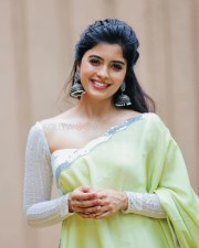 Beautiful Actress Amritha Aiyer in a Chic Green Dress Photos 02