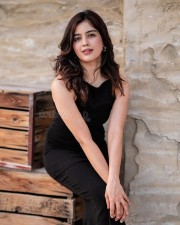 Beautiful Amritha Aiyer in a Black Sleeveless Ruched Dress Photos 02