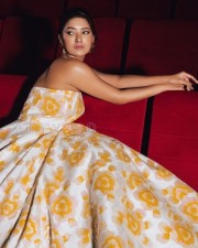 Gorgeous Vani Bhojan in an Off Shoulder Floral Yellow Dress Photos 01