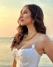 Stunning Sophie Choudry in a White Top at the Beach Photos 03