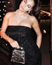 Enchanting Radhika Seth in a Black Glimmering Bodycon Dress Photos 05