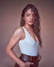 Mesmerizing Wamiqa Gabbi Cleavage in a White Tank Top and Brown Leather Pant Pictures 03