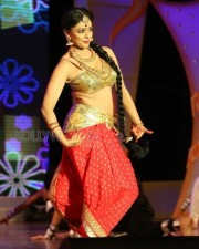 Pooja Kumar Dance Performance At Uttama Villain Audio Launch Photos